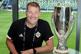 Andy Smyth pictured at Windsor Park with the UEFA Super Cup.