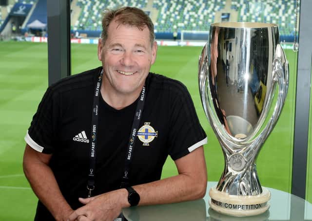 Andy Smyth pictured at Windsor Park with the UEFA Super Cup.