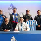 Pictured at the signing of the agreement seated (left to right): Emyr Humphries (Academy Manager Huddersfield Town FC) and David Johnstone (Loughgall FC - Youth Development Manager).
Standing (left to right): James Johnston (LFC Vice Chairman and LFC Youth Chairman), Ernie Smyth (LFC Youth Vice Chairman), Sam Nicholson (LFC Chairman), Dean Smith (LFC 1st Team Manager) and Denver Calvin (LFC Youth Committee Member)