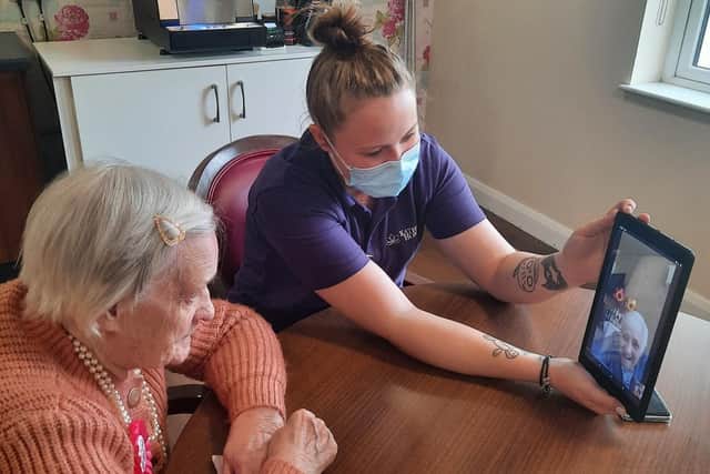 Hannah Rogers was delighted to make the virtual connection with her twin sister to celebrate their 90th birthday