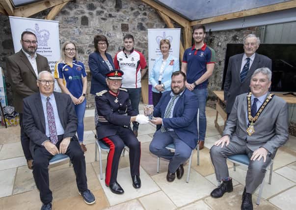 Pictured at a special event to mark the presentation of the Queen's Award for Voluntary Service (QAVS) to North Antrim Agricultural Association are, back row, left to right, Robert Calvin, Rachel Smith, Sandra Adair MBE, James Kirkpatrick, Councillor Joan Baird OBE, Ryan Gamble, Joe Patton CBE. Front row, left to right, James Morrison, Lord Lieutenant for County Antrim Mr David McCorkell, Robert Shannon and the Mayor of Causeway Coast and Glens Borough Council Councillor Richard Holmes.PICTURE STEVEN MCAULEY/MCAULEY MULTIMEDIA