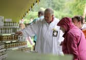 Mervyn Warrington of Killinchy Beekeepers Association with Catherine Rafferty and Ann Hodginton.

Picture: Philip Magowan/Press Eye