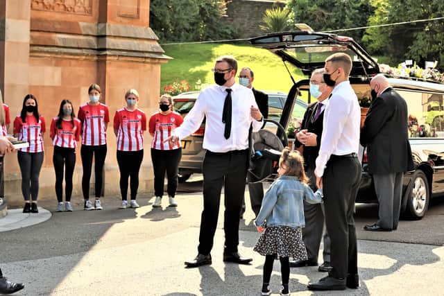 Josh Willis (centre), husband of Samantha Willis (nee Curran) as the hearse carrying her coffin arrives outside St Columb's Church, Londonderry, for the funeral of the mother-of-four from Strathfoyle who died with Covid-19 shortly after giving birth on Friday. Picture date: Monday August 23, 2021.