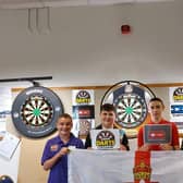 Carrickfergus Junior Darts Academy players Callum Macdougall, Jake Sproule (team captain), Ryan Fowles, and Craig Murtagh.   The group will be the very first Northern Ireland team to compete at the JDC Junior Darts Corporation World Cup, and will travel to Gibraltar in November for a full week of competing.