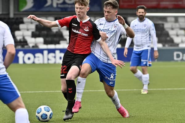 Highly-rated teenager Jack Patterson (left) on show in the Irish League for Crusaders. Pic by INPHO.