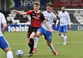 Highly-rated teenager Jack Patterson (left) on show in the Irish League for Crusaders. Pic by INPHO.