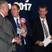 Successful Lagan Valley DUP candidates Paul Givan (centre) and Edwin Poots (right) congratulate Pat Catney of the SDLP on his election to the NI Assembly in 2017. Photograph: Declan Roughan