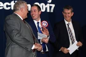Successful Lagan Valley DUP candidates Paul Givan (centre) and Edwin Poots (right) congratulate Pat Catney of the SDLP on his election to the NI Assembly in 2017. Photograph: Declan Roughan