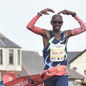 Sir Mo Farah stretching clear in the closing stages of the Antrim Coast Half Marathon in 2020. 
Picture: Colm Lenaghan/Pacemaker