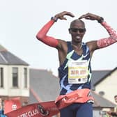 Sir Mo Farah stretching clear in the closing stages of the Antrim Coast Half Marathon in 2020. Picture: Colm Lenaghan/Pacemaker