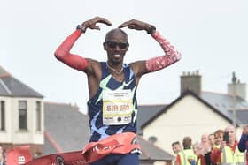 Sir Mo Farah stretching clear in the closing stages of the Antrim Coast Half Marathon in 2020. 
Picture: Colm Lenaghan/Pacemaker