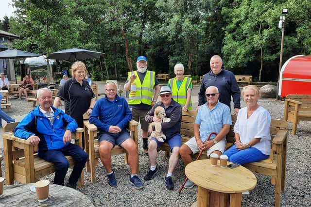 Davy and Teresa Boyle (back centre) with their charity walk supporters: (back) Frances from The Coffee Dock and Nevin Boyle. Front - Maurice Greer, David Kane, Curtis Magee, Denis McNeill and Helen McNeill