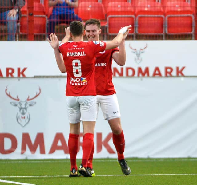 Kofi Balmer celebrates his goal during the game at Inver Park, Larne Photo Andrew McCarroll/ Pacemaker Press