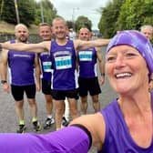 Helena Dornan at the Antrim Coast Marathon with L - R Barry Mullan, Chris Holmes, Maurice Walker, Niall Kennedy