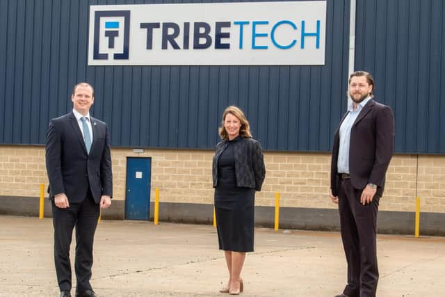 Economy Minister, Gordon Lyons with Charlie King, managing director of Tribe Technology and Anne Beggs, director of Trade and Investment for Invest NI.