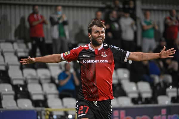 Crusaders' Johnny McMurray celebrates after he  scores to make it 2-0.  Mandatory Credit Inpho/Stephen Hamilton