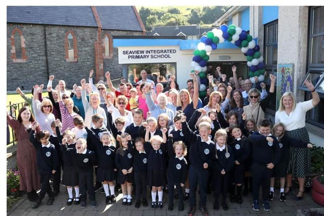 Celebrations as Seaview Primary School in Glenarm transfers to controlled integrated status.  Photograph by Declan Roughan