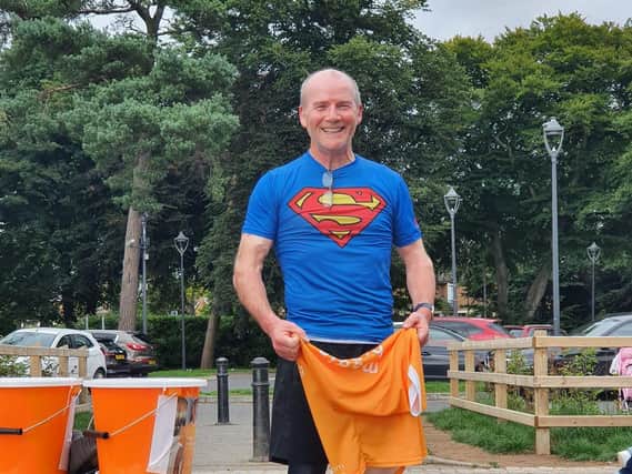Mark looks elated after completing  his seventh marathon in seven days - and says he is is already planning his challenge for next year!