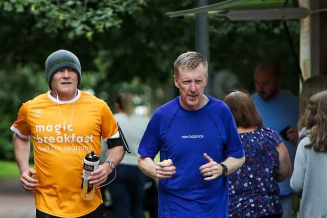 Mark receives support from his step-brother during his final marathon of the week
