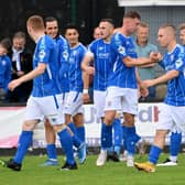 Matthew Shevlin (centre) takes the plaudits after putting Coleraine 2-0 ahead