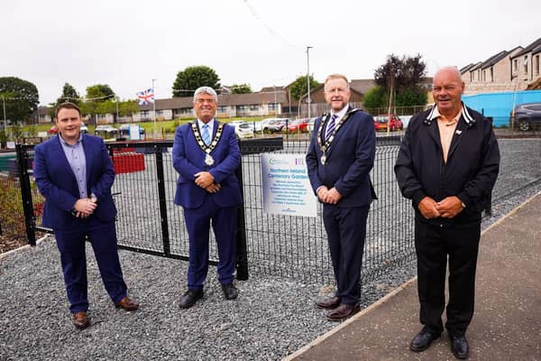 Mayor of Antrim and Newtownabbey Cllr Billy Webb and Deputy Mayor Cllr Stephen Ross unveiling the plaque for the Northern Ireland Centenary Garden with Cllr Mark Cooper and Chair of the Monkstown Community Association David McCrea.