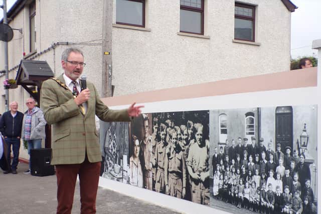 The Mayor, Councillor William McCaughey unveiling the mural.