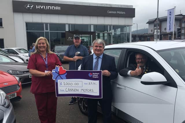 Gibson Wharry, sales director, Cannon Motors Hyundai and NI Hospice nurse Shauvaun McKeown with the Mayor of Mid and East Antrim, Councillor William McCaughey and Golf Day event organiser Kevin Haveron.