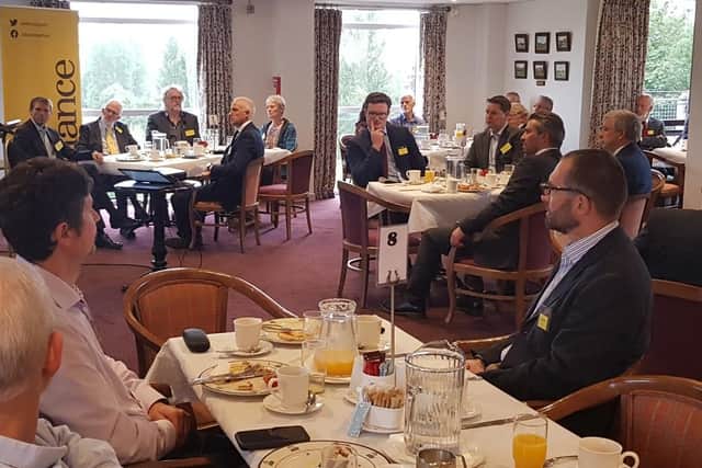 A packed Alliance business breakfast with attendees enjoying the presentation from Fina Gael TD Neale Richmond in Carrickfergus.