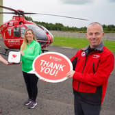 Mark Baillie of MKB Medical and Bronagh Luke from Henderson Group are pictured with the defibrillator they have donated to Air Ambulance NI with Glenn O’Rorke, Operational Lead Paramedic with the Helicopter Emergency Medical Service. The new device will reside outside the organisation’s headquarters on Halftown Road in Lisburn, registered to The Circuit and available 24/7 should it be needed locallyPhoto by Aaron McCracken