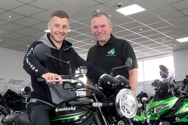 Stephen pictured with Jonathan Rea at the handover of Jonathan's new bike
