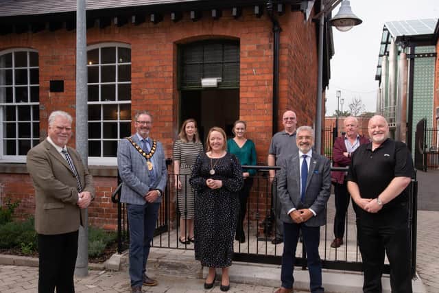 THI Board members and council staff pictured alongside Mayor of MEA, Cllr William McCaughey and Mukesh Sharma MBE DL, HLF NI Chair.