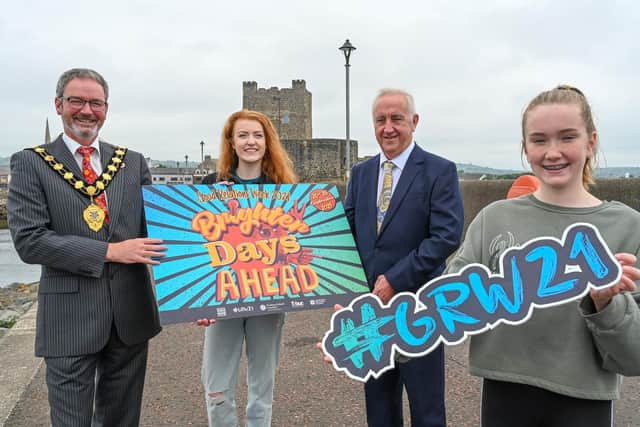 The Mayor of Mid and East Antrim, Cllr William McCaughey with Martin McDonald, Chair of The Community Relations Council and Sophie Grier and Evie Dorrian from Uplift Performing Arts.