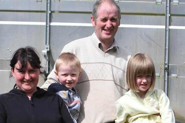 Paul and Wendy McDonnell and their children Sarah and Ryan with their pen of champion Kerry Hills at the Glenravel Festival Country Fair in August 2009. Picture: John McIlwaine/Ballymena Times/Farming Life archives