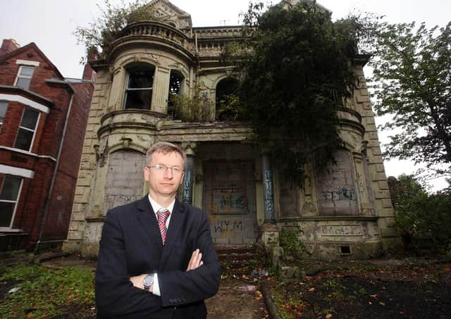 The home of former Detective Inspector John Nixon on the 9 Ballygomartin Road in Belfast. Local DUP councillor Brian Kingston pictured at the house in September 2010. Picture: Jonathan Porter/Presseye.com