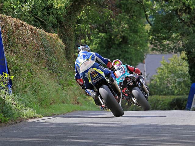 Adam McLean leads Mike Browne in the Open A Superbike race at the Cookstown 100 on Saturday.
