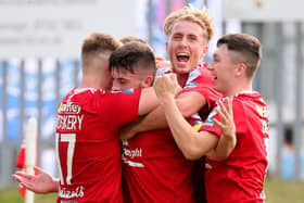 Portadown players after moving into the lead over Linfield. Pic by Pacemaker.