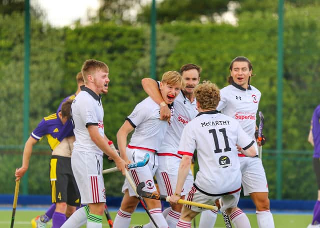 YMCA celebrate a Matthew Walker goal. Picture: Sinéad Hingston