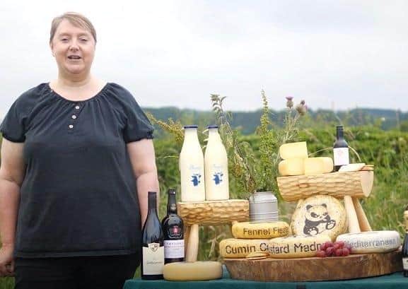 Carol Koster with some of the produce made by Carrickfergus Cheese.