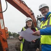 The Mayor of Mid and East Antrim, Cllr William McCaughey and Jessica Stronge, site manager, from CIVCO., look over the plans at Sullatober household recycling cente.