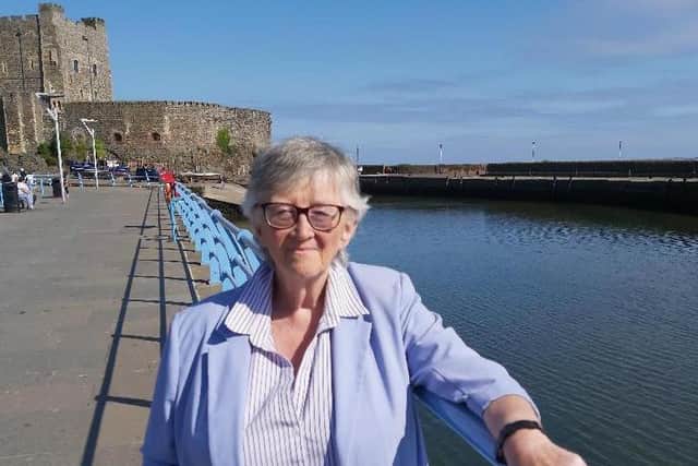 Linda Hagan at Carrickfergus Castle.  The town's marina is 'crucial' to her storyline, says the author.