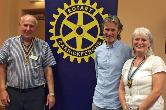 Carrickfergus Rotary president Sam Crowe with newly inducted Rotarian Jim McGavock and Rotarian Hilary McGavock.
