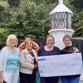 Liz McCaffrey, Heather Garrett, LeeAnn Clarke and Karen McMeekan presenting the 1in3 cheque at Hope House.