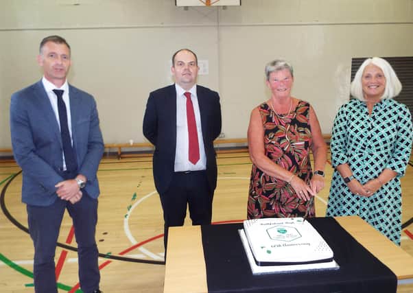 Chairman of the Board of Governors, Mr Ian McConnell, current Principal Mr Ian Matthews, former Principal Mrs Amanda McCullough and Vice Principal Mrs Ruth Chalmers join staff and governors to mark the anniversary of the school’s opening
