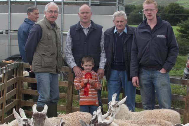 Martin and Ryan McAuley, first and third,  with John Christie, Glen Farm Supplies, Harold Dickey and Ian Gibson during the Cargan sheep sale which was held at the end of August 2009. Pictures: Steven McAuley/Kevin McAuley Photography/Multimedia/Farming Life archives