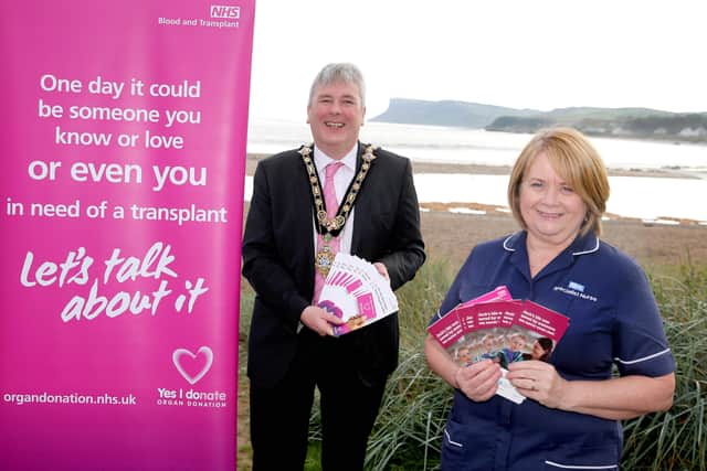 The Mayor of Causeway Coast and Glens Borough Council Councillor Richard Holmes in Ballycastle with Northern Trust Specialist Nurse for Organ Donation Mary McAfee in Ballycastle