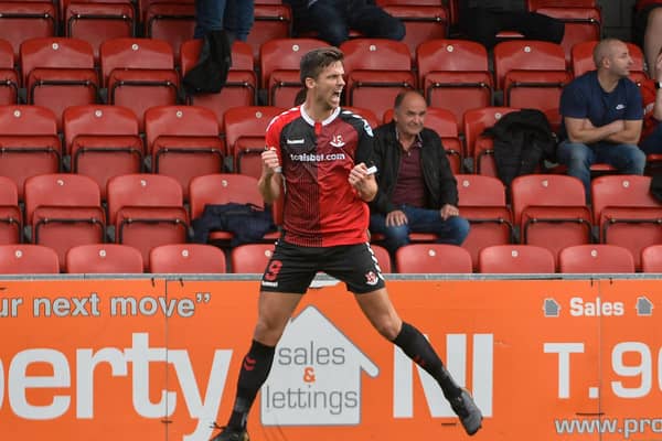 Adam Lecky celebrates his goal for Crusaders