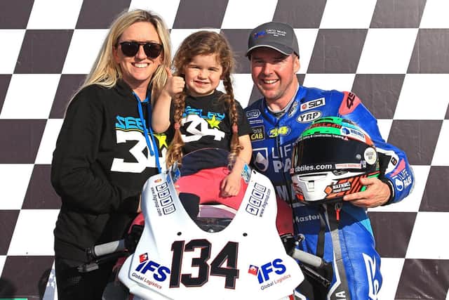 Alastair Seeley with his fiancee Danielle and daughter Olivia-Grace at Bishopscourt in Co Down on Saturday, where he won both Superbike and Supersport races to wrap up an Ulster championship double.