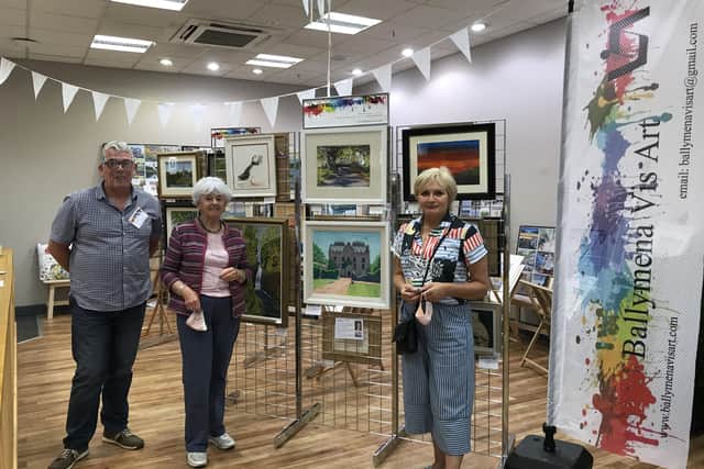 Pictured in the Ballymena Vis Art Exhibition and Pop Up Shop in The Tower Centre, Ballymena, are - Vis Art members Stephen Brown, Catherine Flood (President) and Maria Hunter
