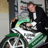 Bob Mullan with the 125cc PJ O'Kane Honda raced by Robert Dunlop that he bought during a tribute night held in memory of the Ballymoney road racing legend in 2008.