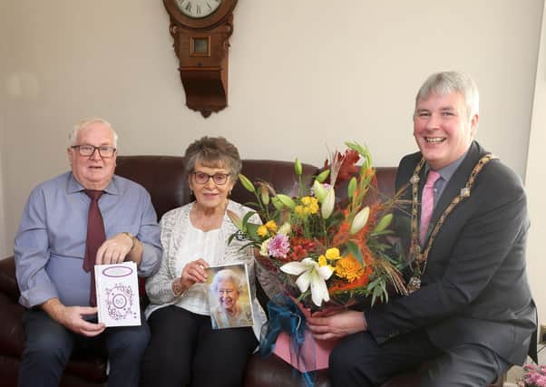 The Mayor of Causeway Coast and Glens Borough Council pictured during his visit to Alan and Betty McIlmoyle to mark the couple’s 60th wedding anniversary